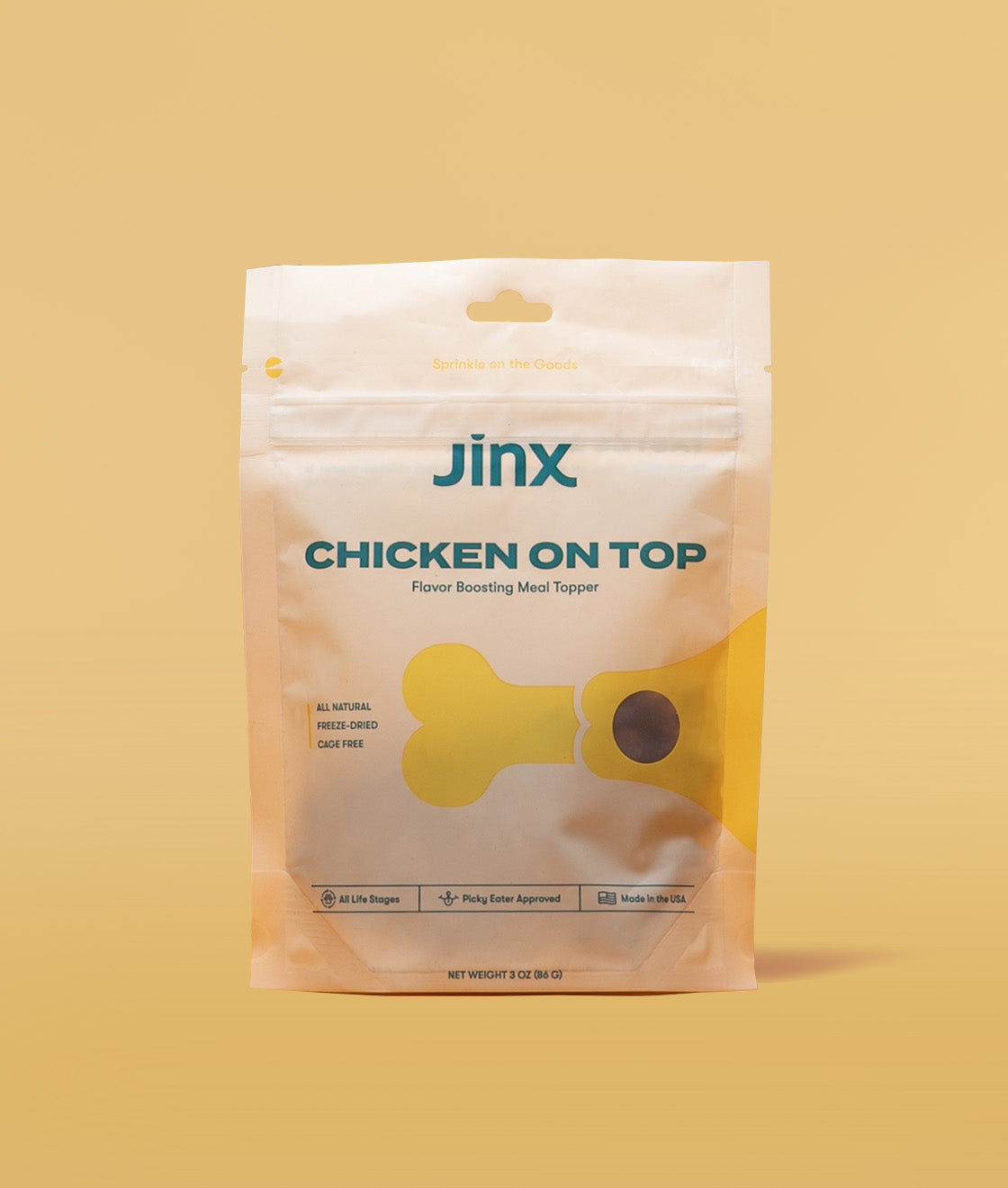 Chicken topper Jinx product packaging on a yellow background